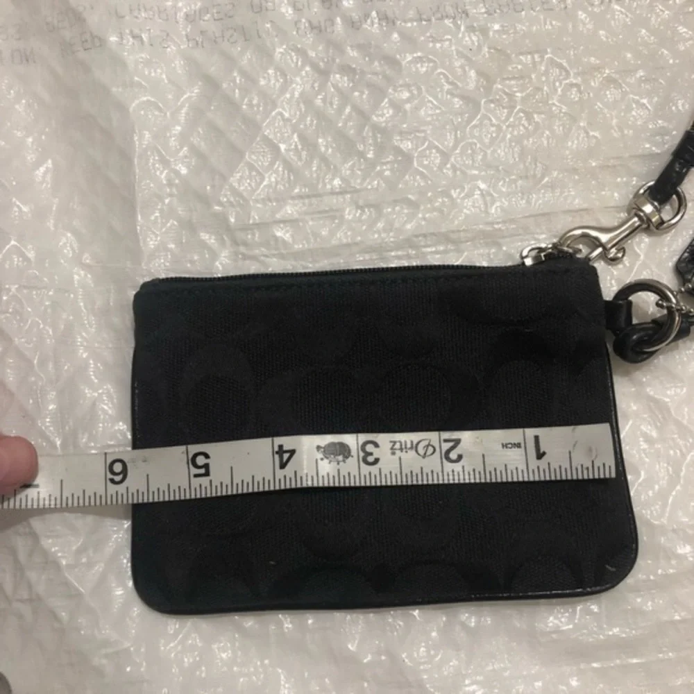 Coach black signature wristlet bag